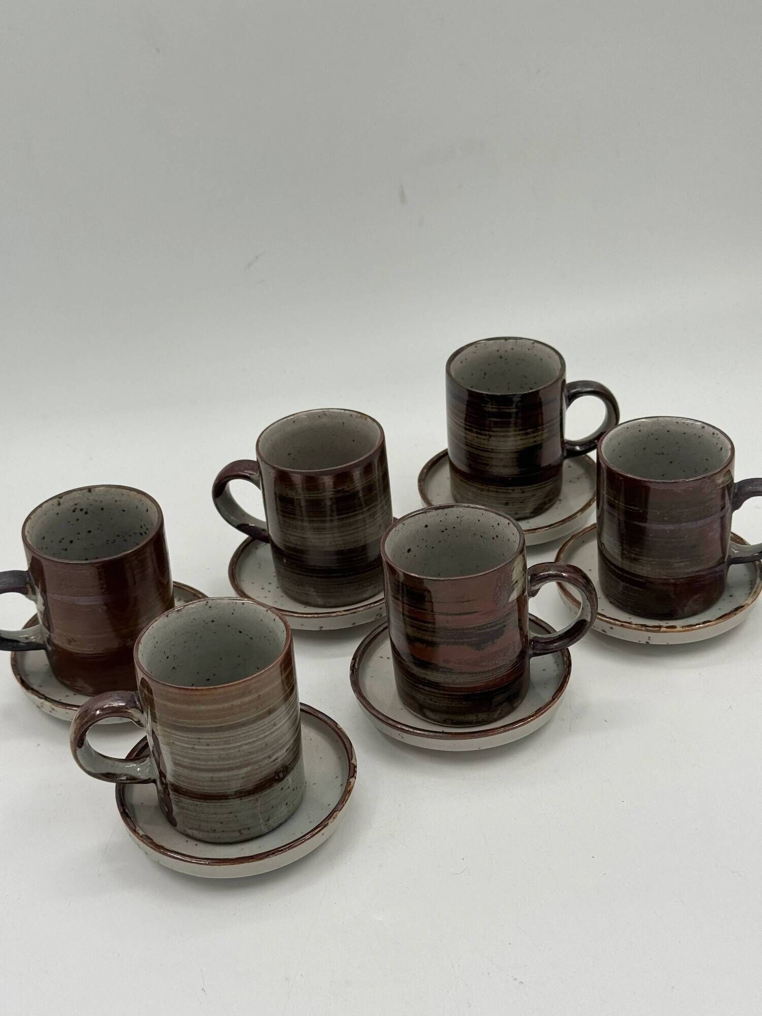 Set of 6 vintage handmade stoneware cups and saucers.