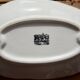 Antique leaf-shaped white English slipware dish.