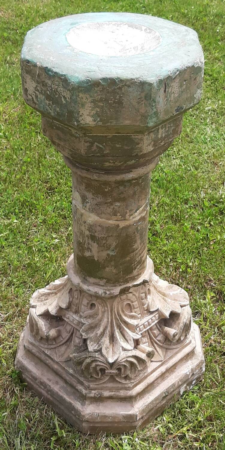 Holy water font on stone column (17th century)