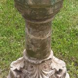 Holy water font on stone column (17th century)