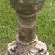 Holy water font on stone column (17th century)