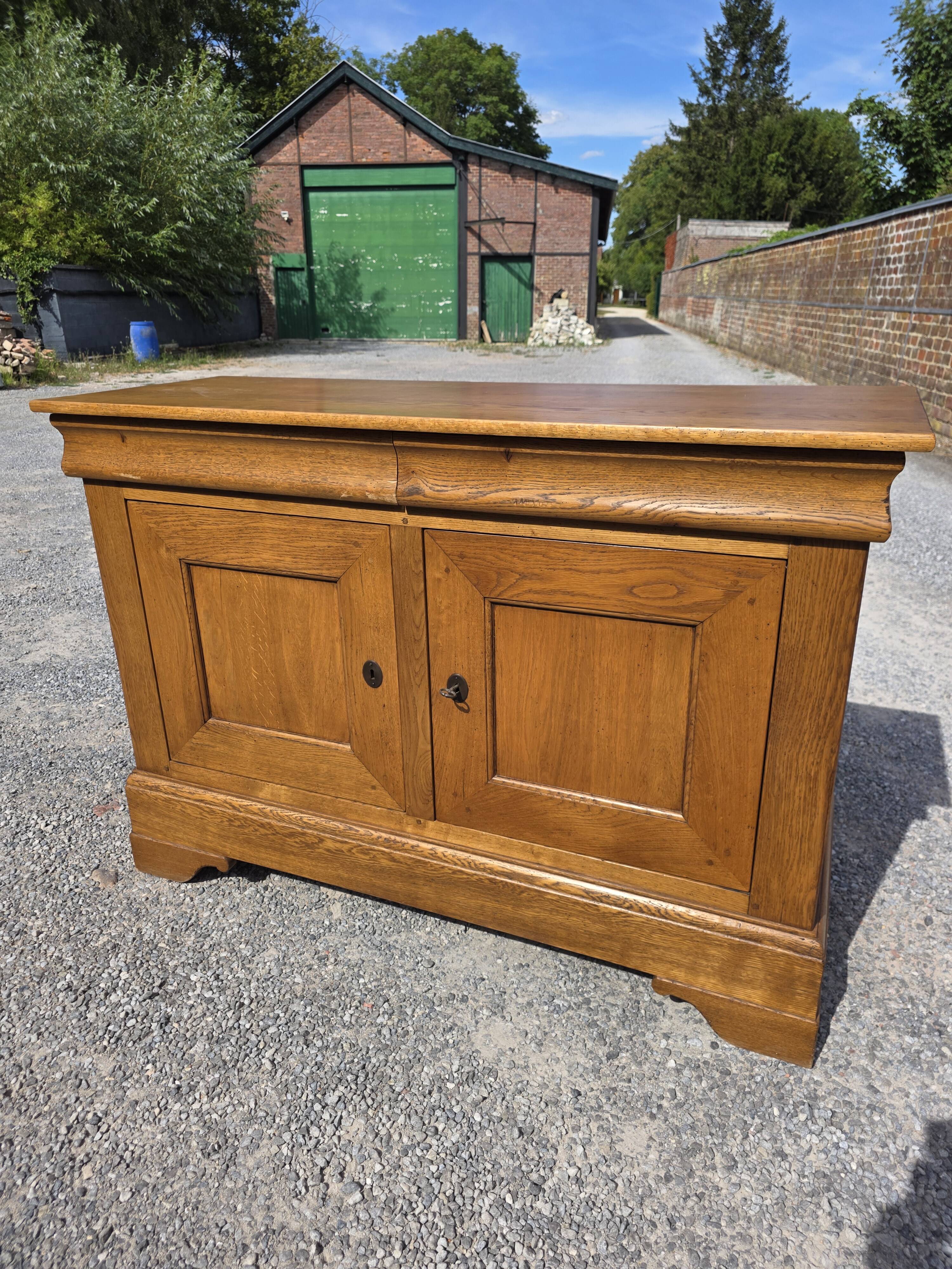 Louis Philippe buffet in solid oak.