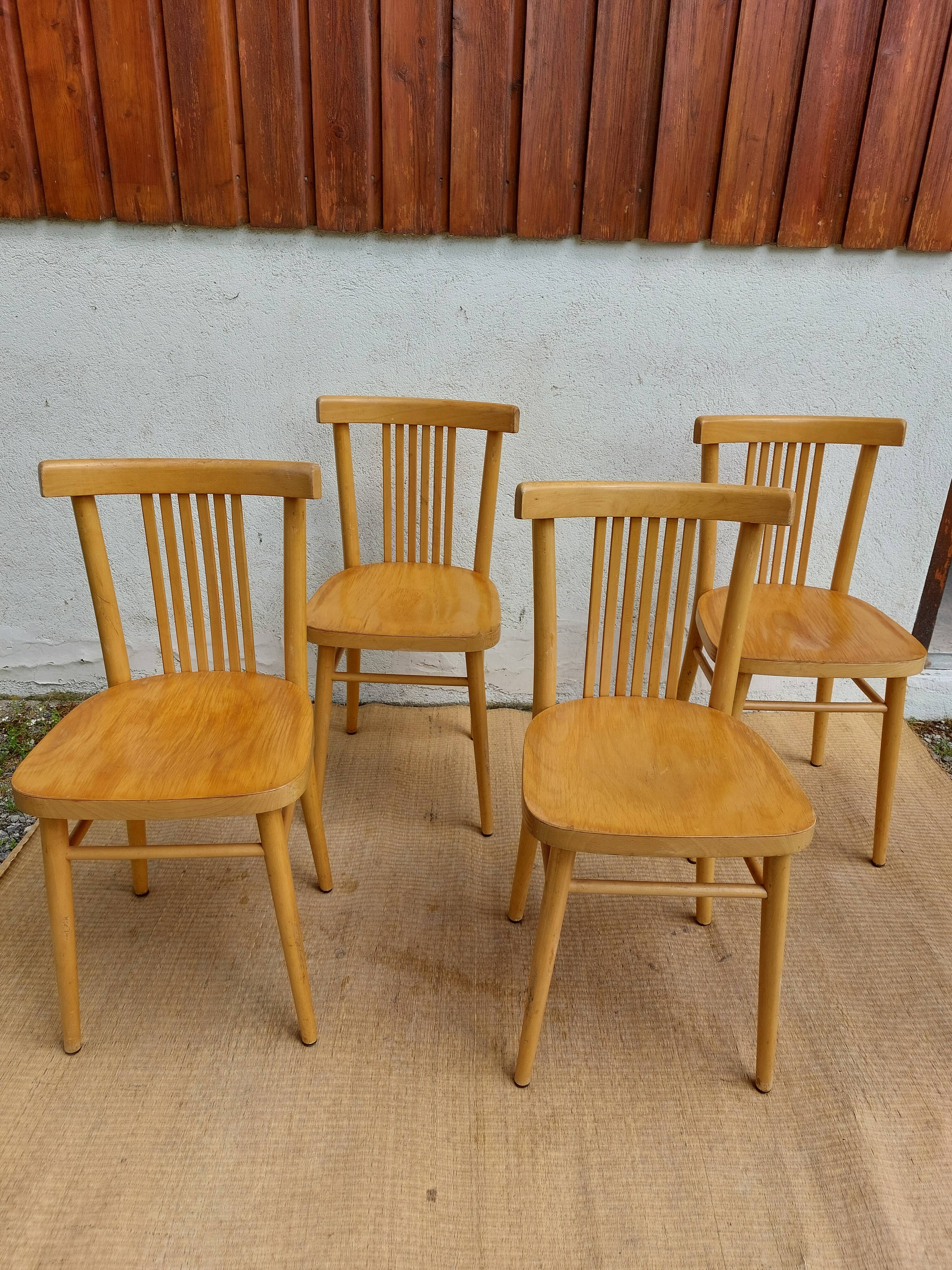 4 light wood bistro chairs