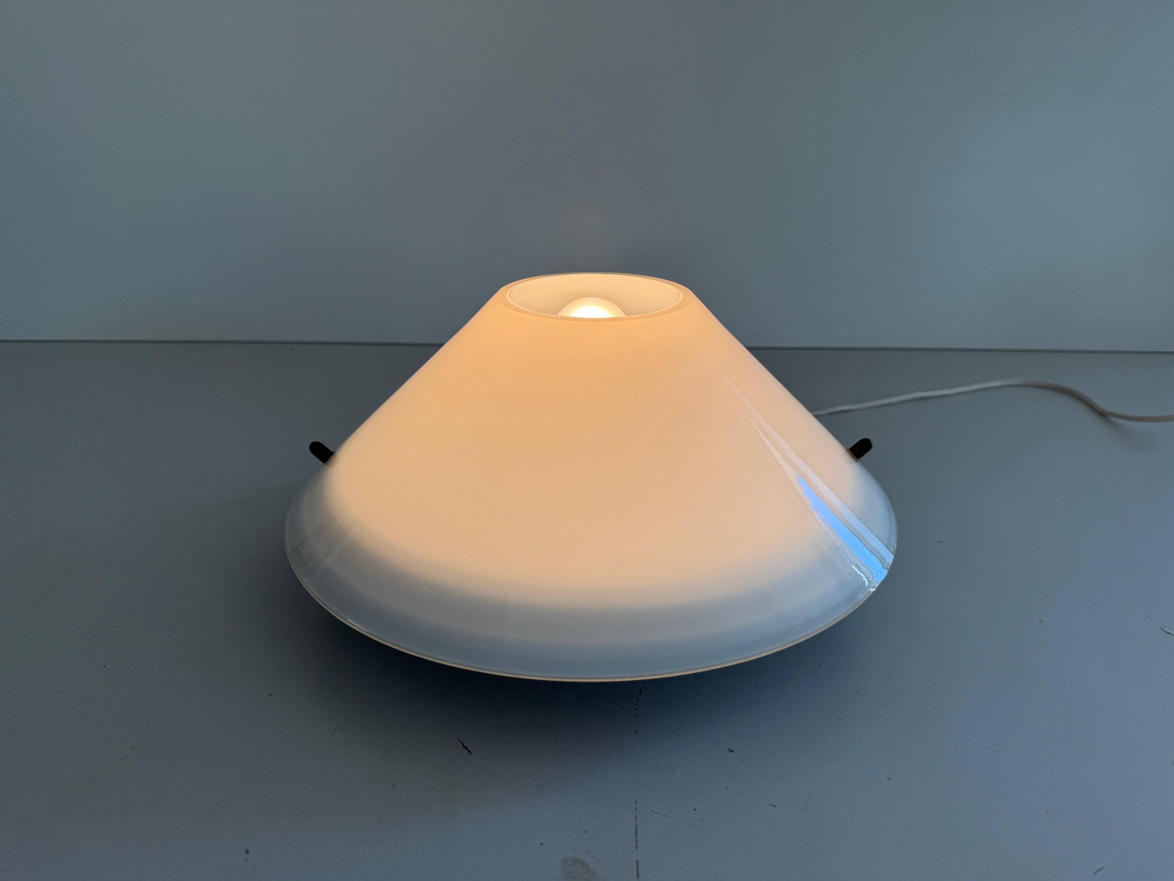 Simple opal glass wall light from the mid-century by Lamperti, 1960s, Italy.