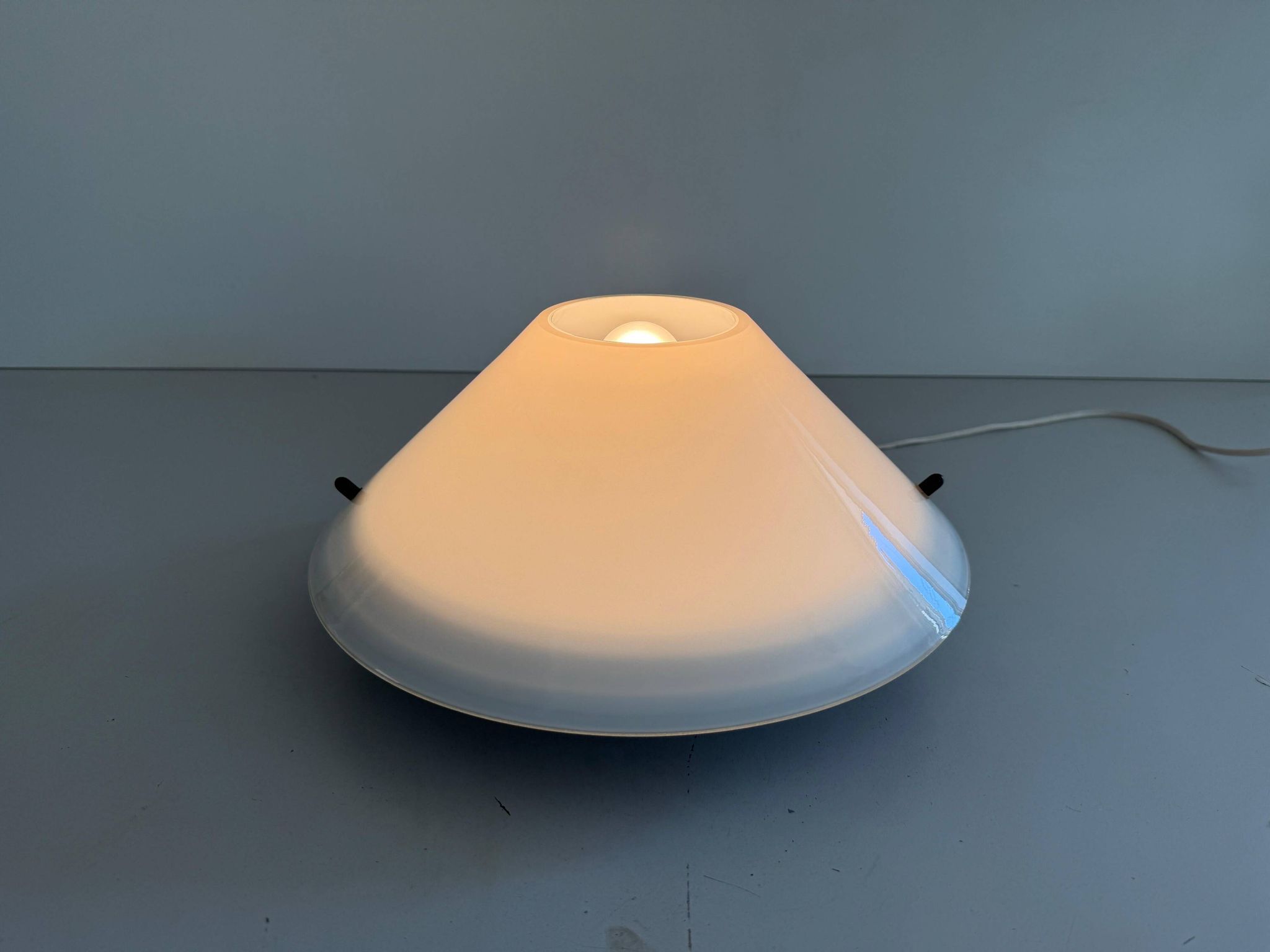 Simple opal glass wall light from the mid-century by Lamperti, 1960s, Italy.