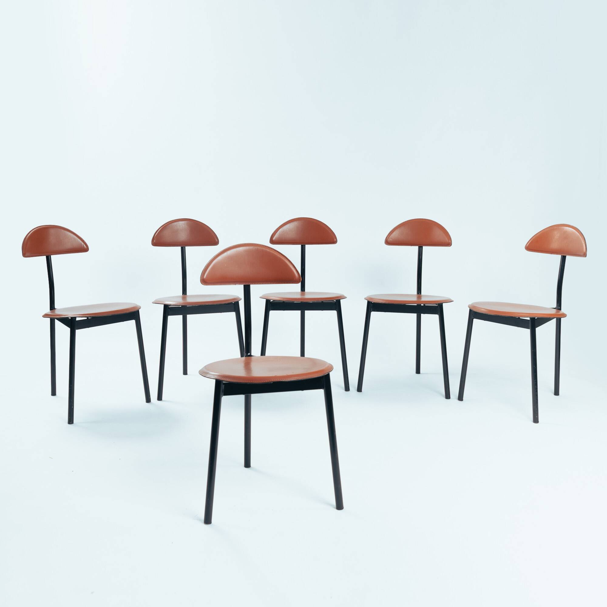 6 Linea Veam leather tripod chairs, Italy 1980s