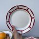 7 flat plates in white and red burgundy porcelain vintage Badonviller model Louise