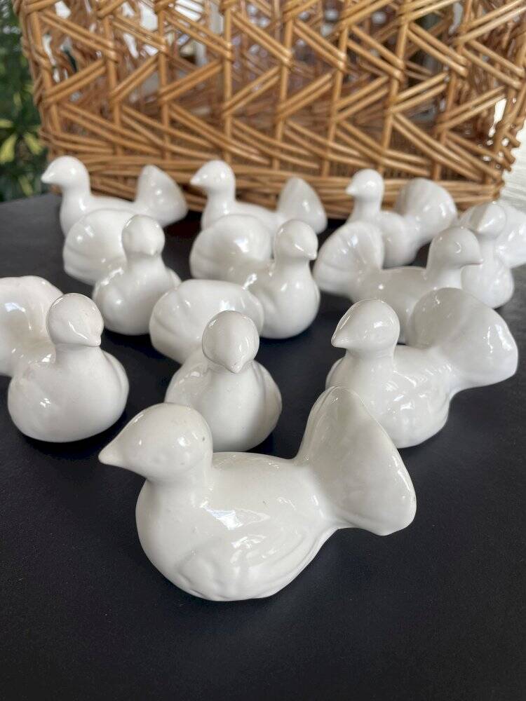 11 zoomorphic ceramic knife rests in white