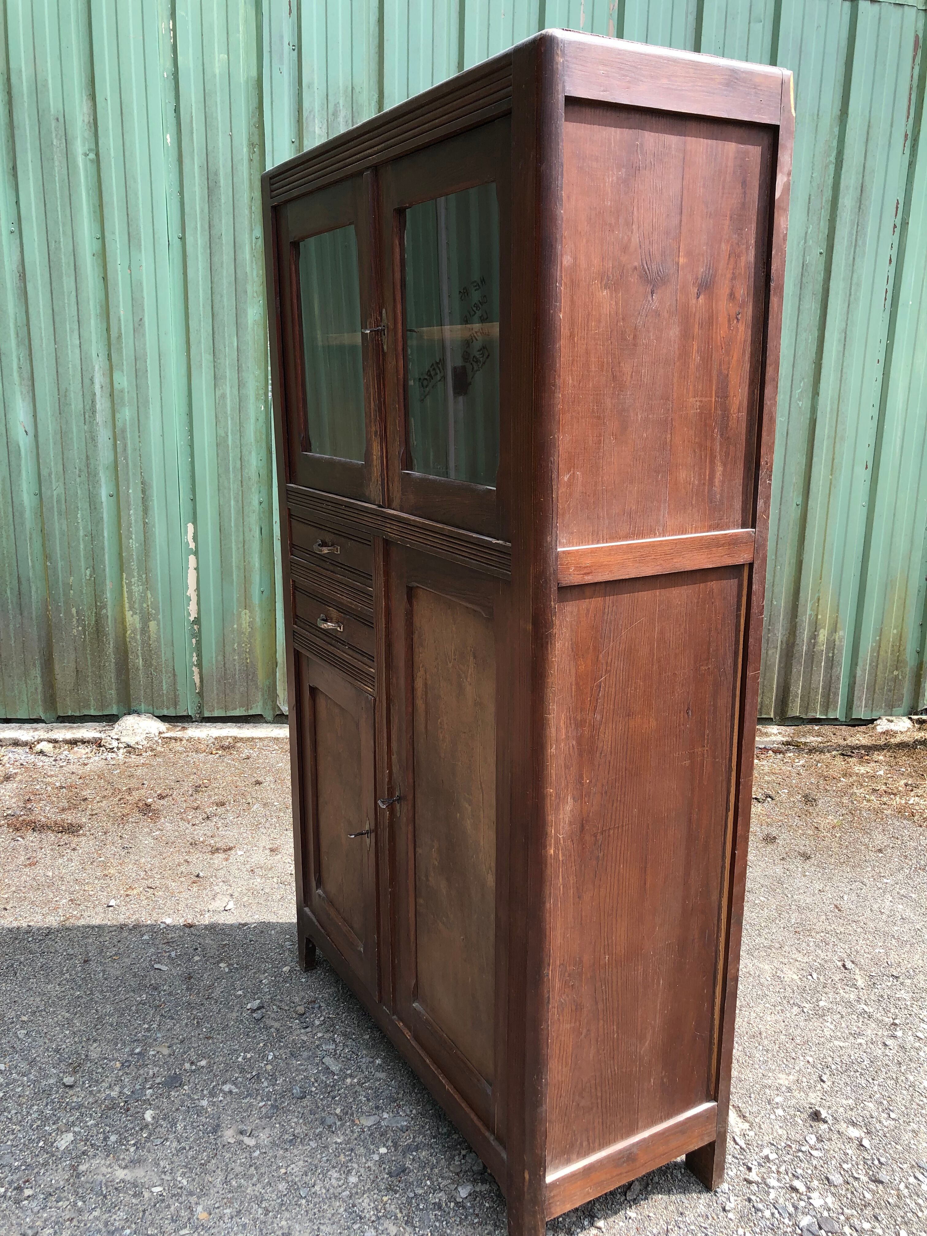 Vintage Parisian pine cabinet.