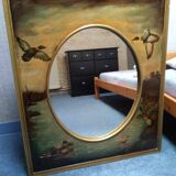Oval mirror in duck pattern frame
