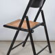 Folding chair seated in cannage