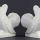 Manufacture de saint-clément, 1930s, pair of bookends figuring pigeons.