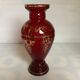 Cameo vase and red cabochons in burgundy glass