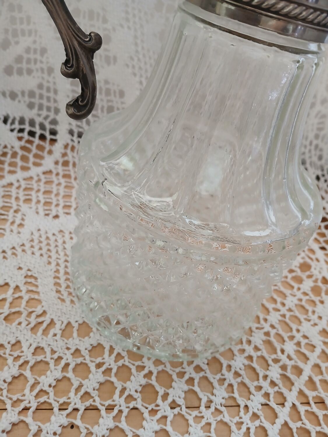 Antique pewter and glass carafe