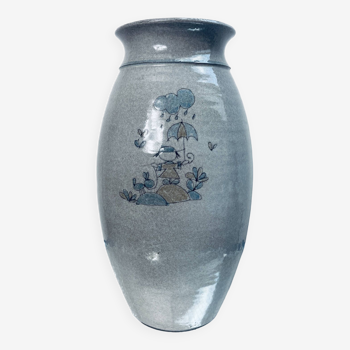 Handcrafted gray stoneware vase with child illustration