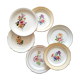Flat earthenware plates with gilded edges