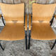 Pair of Vintage RONÉO Armchairs with Black Metal Legs + Curved Wooden Shell