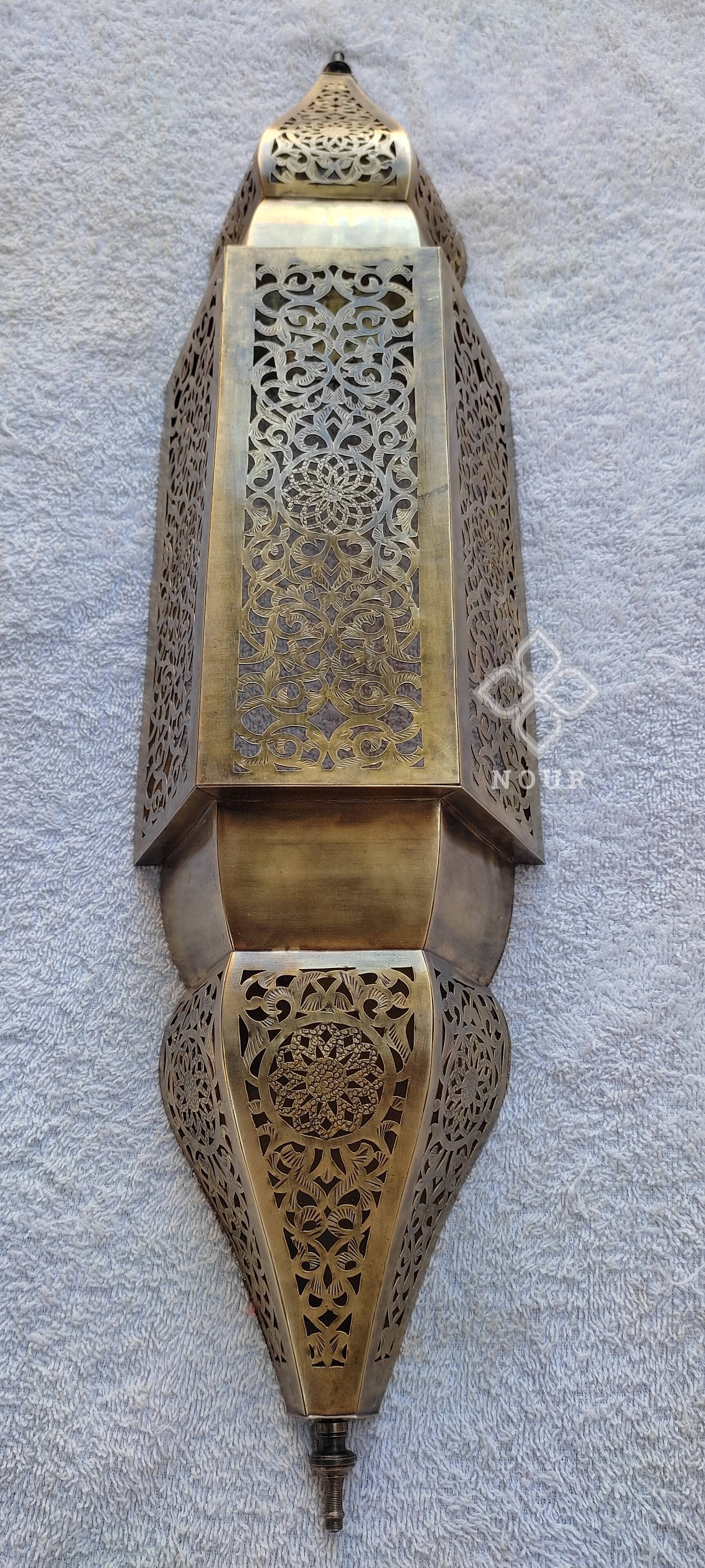 Moroccan brass wall lamp with an antique look