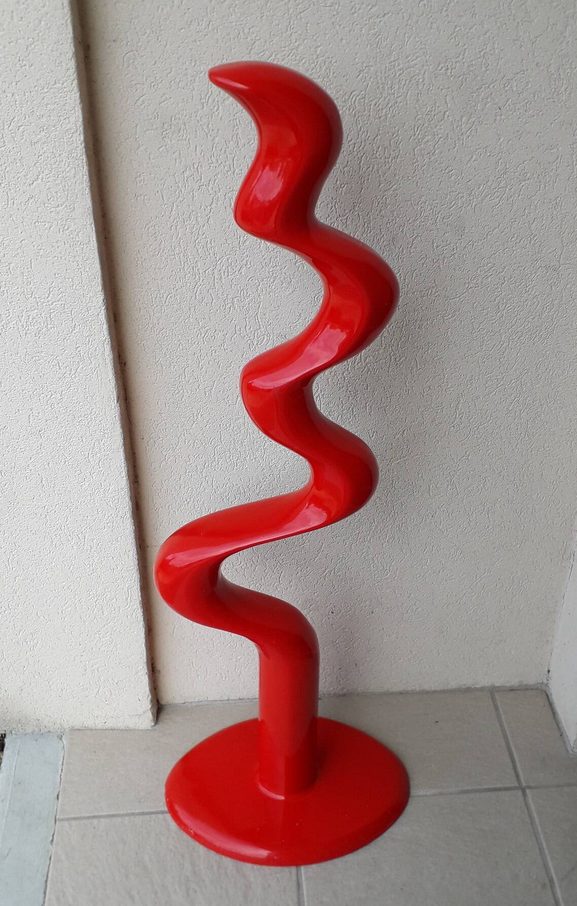 Red sculpture by Döman Tony Almen and Peter Gest