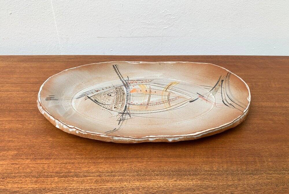 Large German ceramic plate with fish from the mid-century.