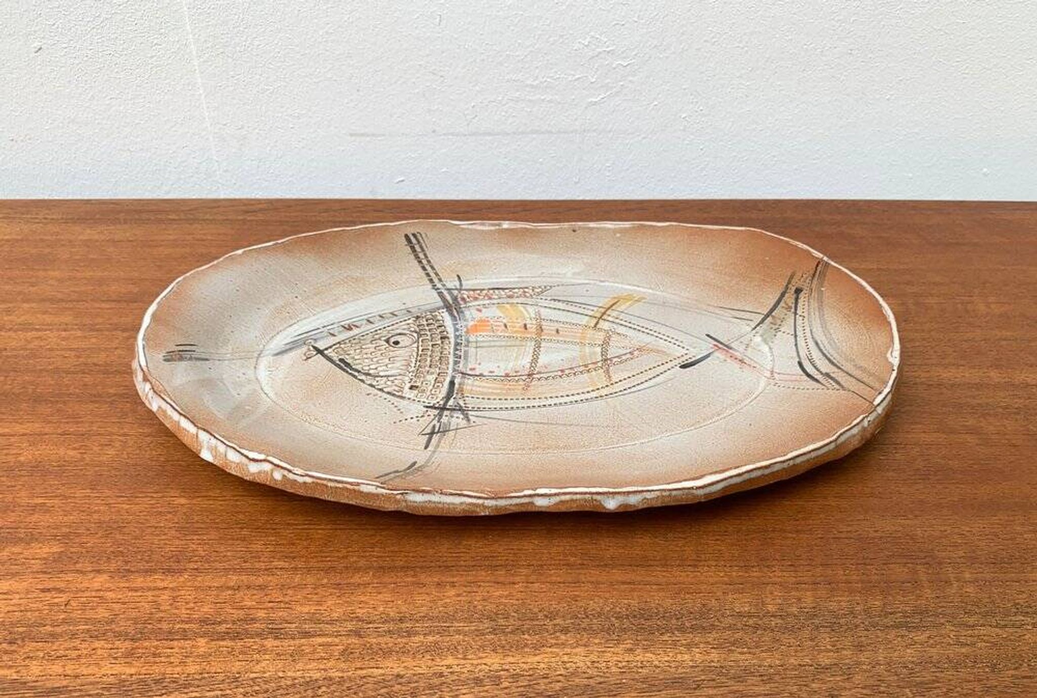 Large German ceramic plate with fish from the mid-century.
