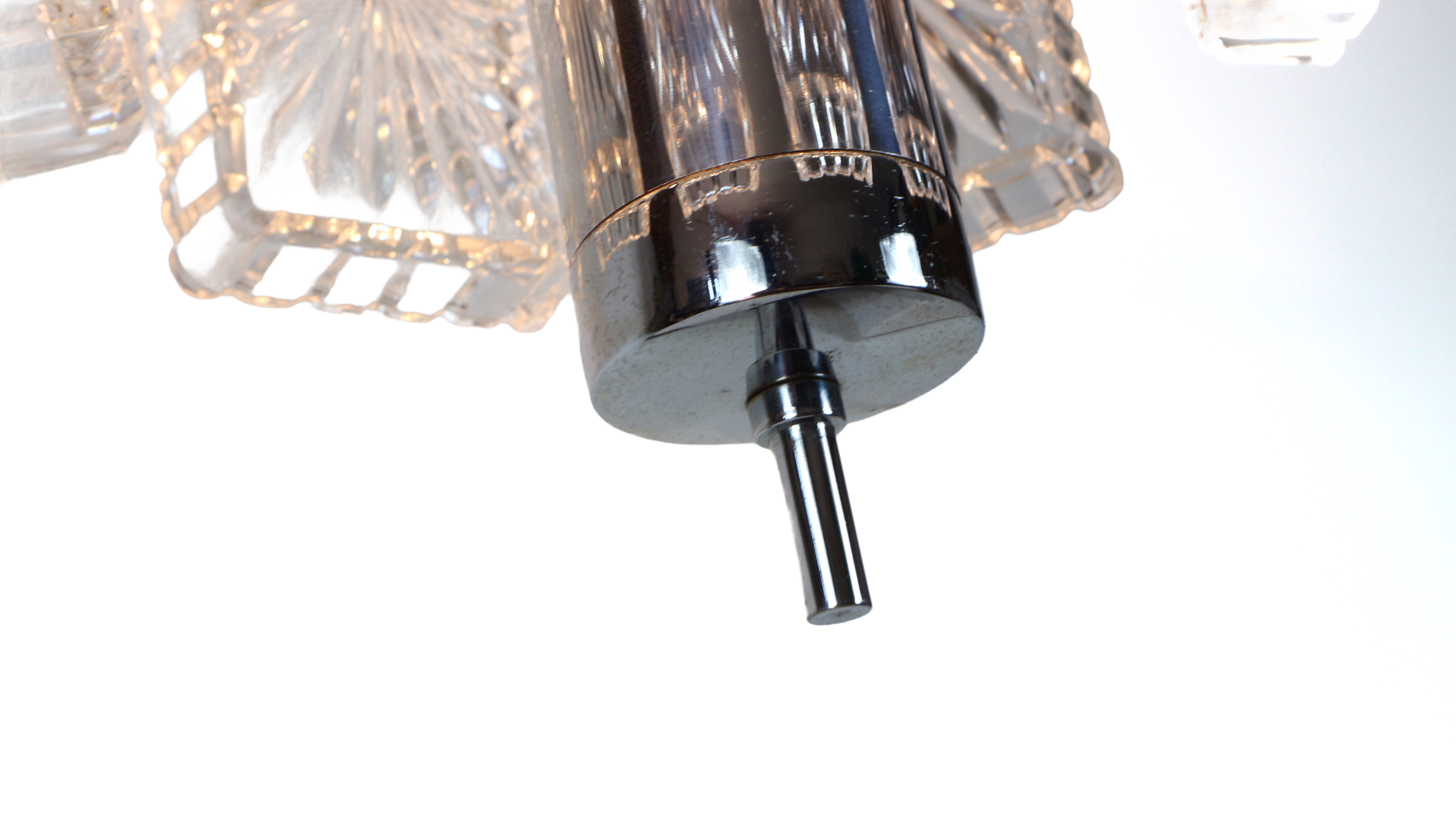 Vintage metal chandelier and carved glass