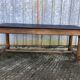 Antique oak farmhouse table with cat bar and 2 end drawers