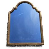 Large gilded wooden mirror in the shape of a gendarme hat