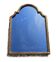 Grand miroir en bois doré forme chapeau de gendarme