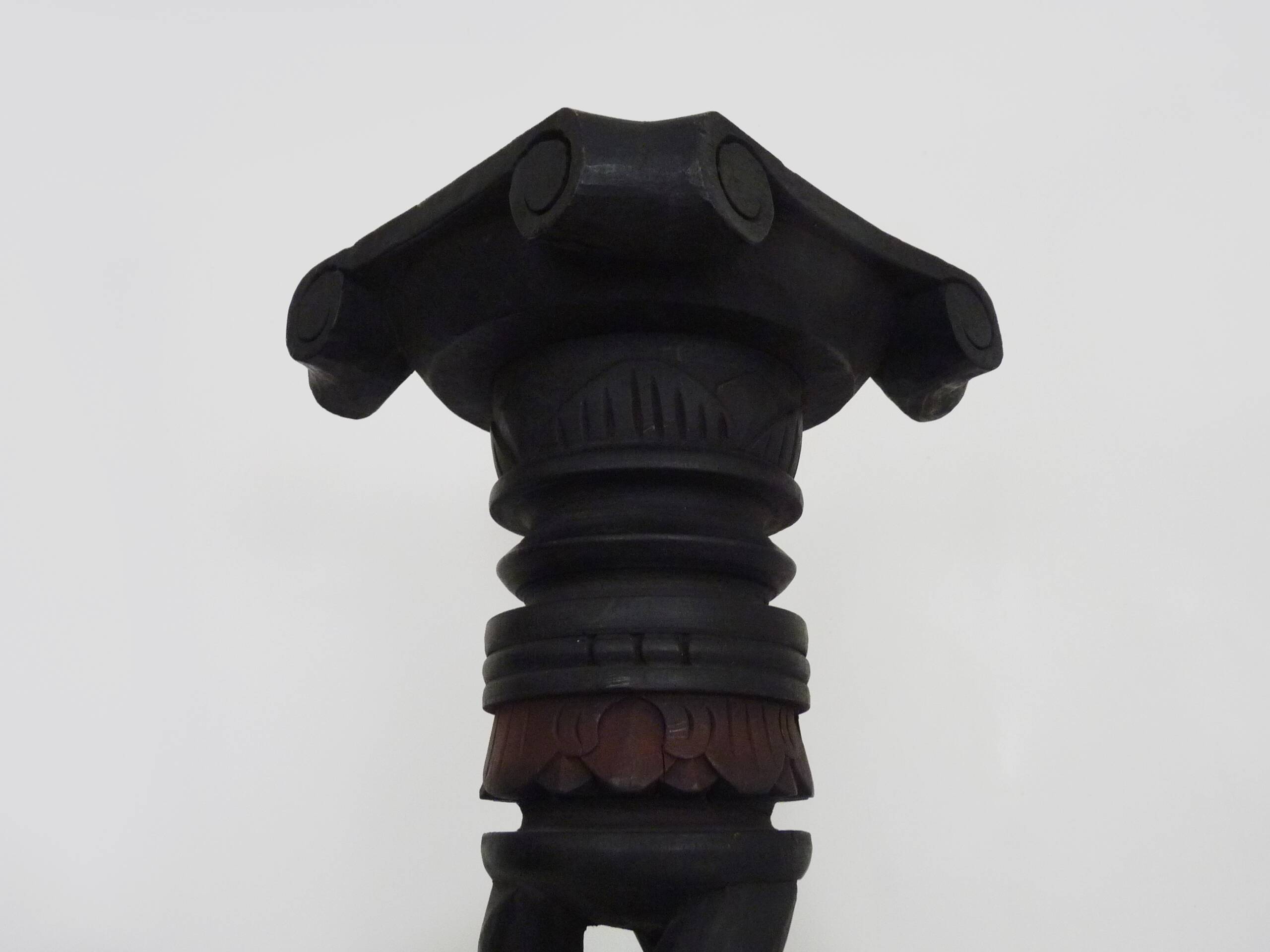 Twisted and engraved blackened wooden pedestal. 1960s 70s.