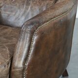 Very comfortable vintage cow leather armchair with character