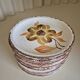 Set of 70's flower decorated plates