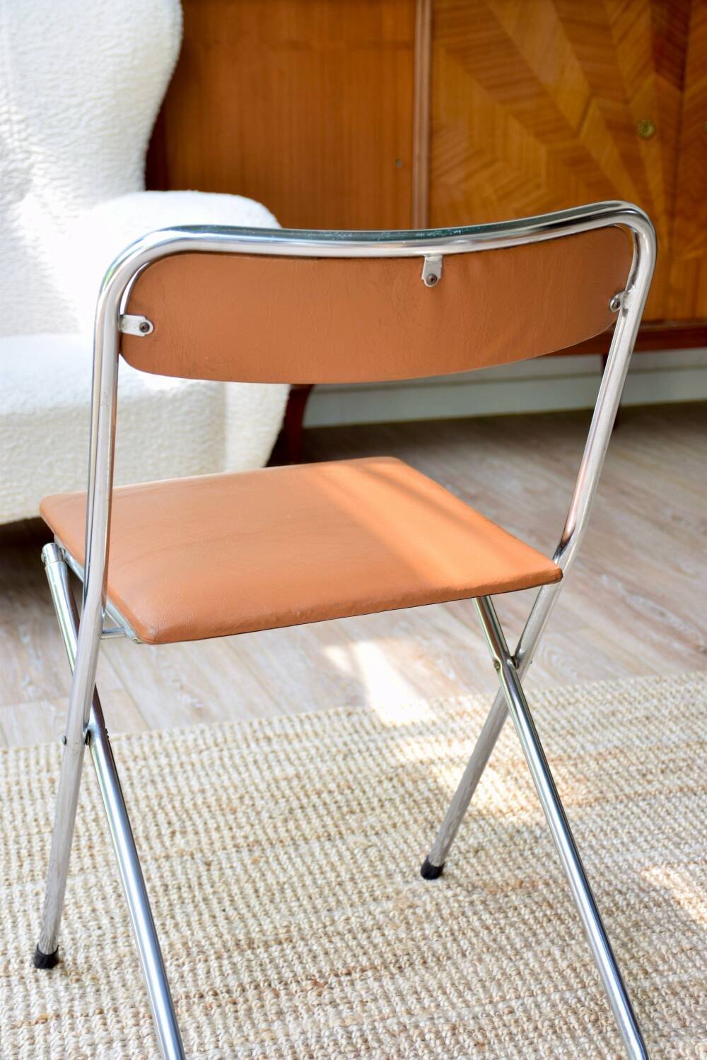 Pair of “Soudexvinyl” folding chairs in skai and chrome tube