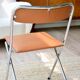 Pair of “Soudexvinyl” folding chairs in skai and chrome tube