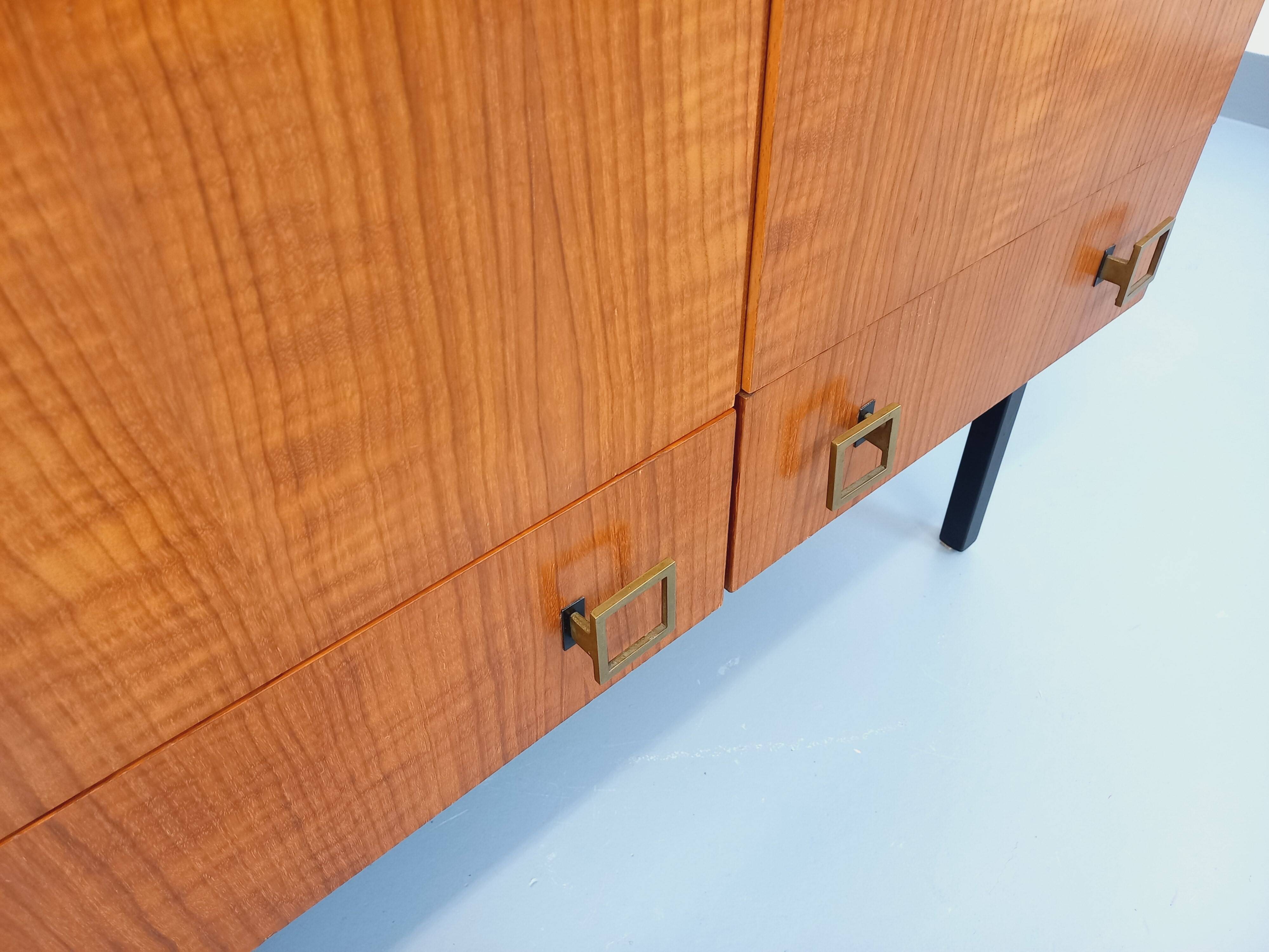 Vintage modernist wardrobe in teak and metal from the 1960s.