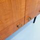 Vintage modernist wardrobe in teak and metal from the 1960s.