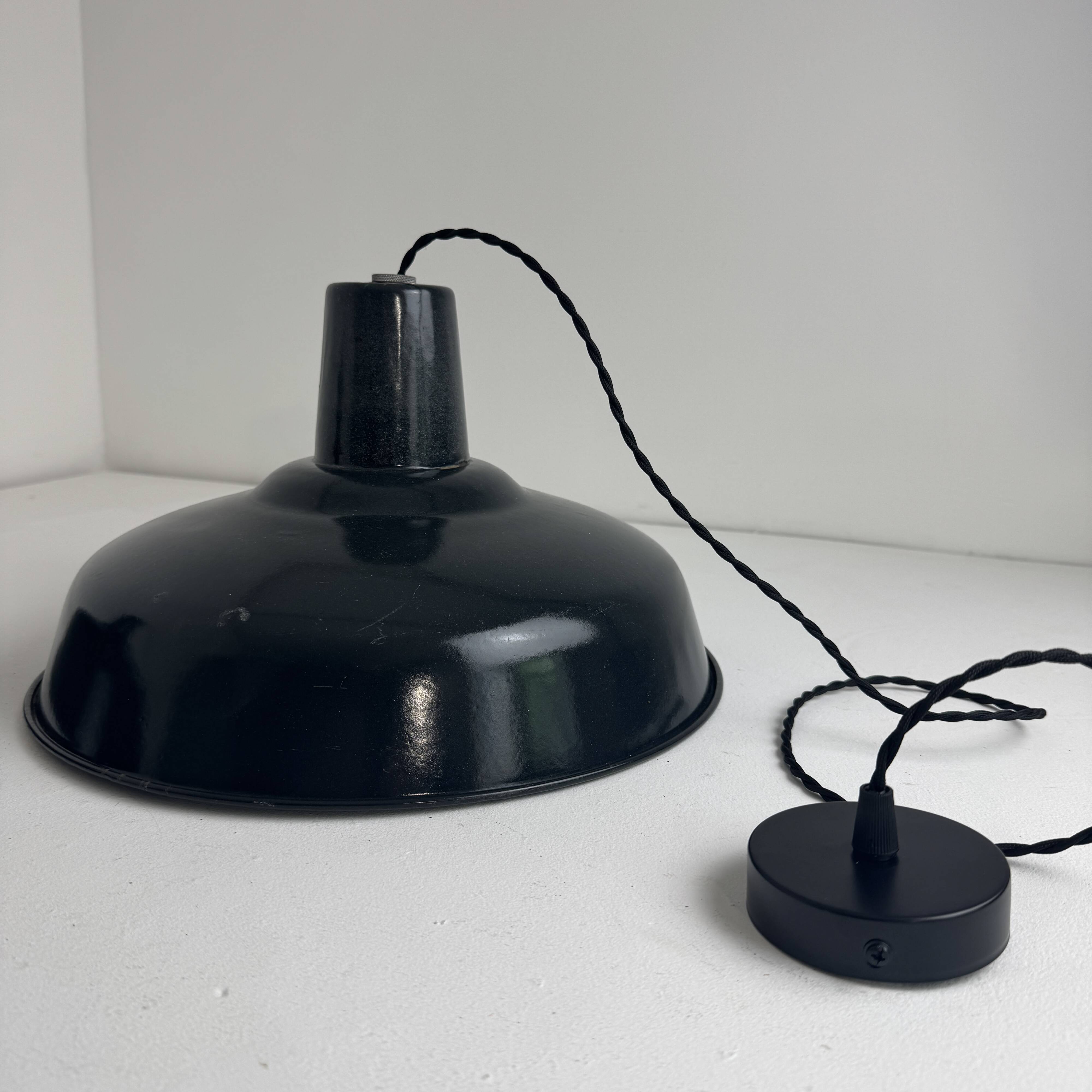 Pair of antique enamelled industrial workshop suspensions