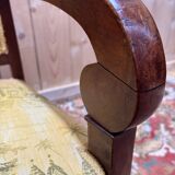 Pair of 19th-century armchairs with a scrolled back