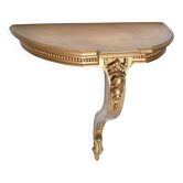 Wall sconce console in carved wood with golden patina