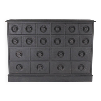 Blackened wooden chest of drawers