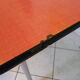 Table in red formica, 4 roc chairs, 2 extension cords, 2 drawers 60