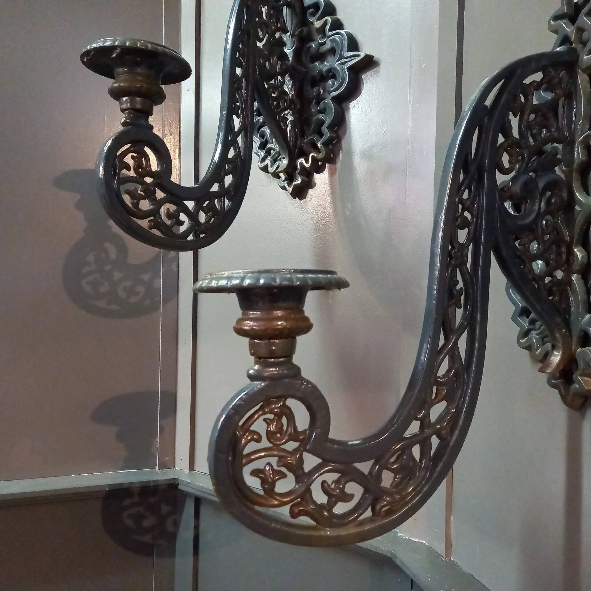 Set of antique neo-Gothic cast iron wall sconces