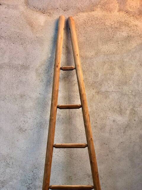 Wooden triangular ladder