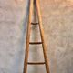 Wooden triangular ladder