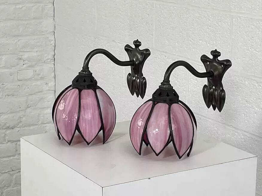 Pair of Tiffany style iron and glass leg wall lights