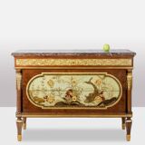 Empire style chest of drawers in lacquer, bronze and marble. Nineteenth century.