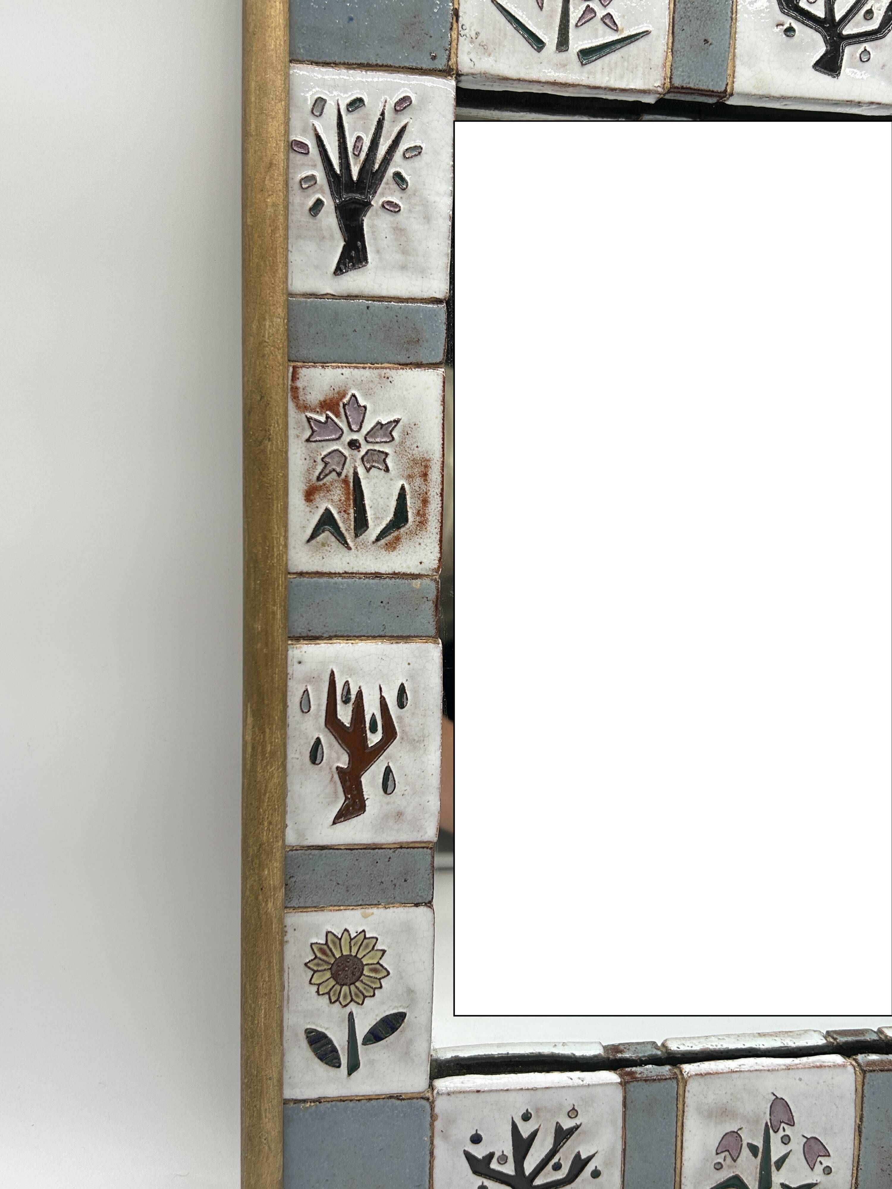 Ceramic enamelled mirror in the style of Odette Dijeux.