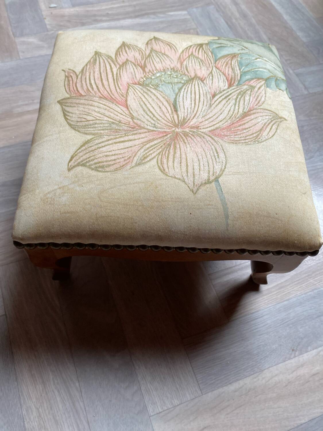 Vintage upholstered stool/footrest