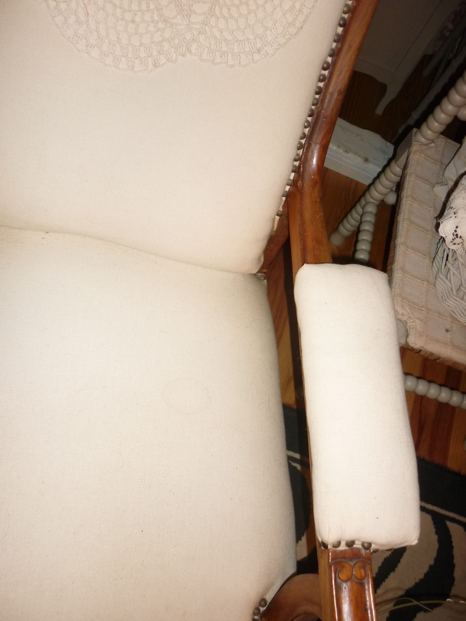 Armchair and its footrest
