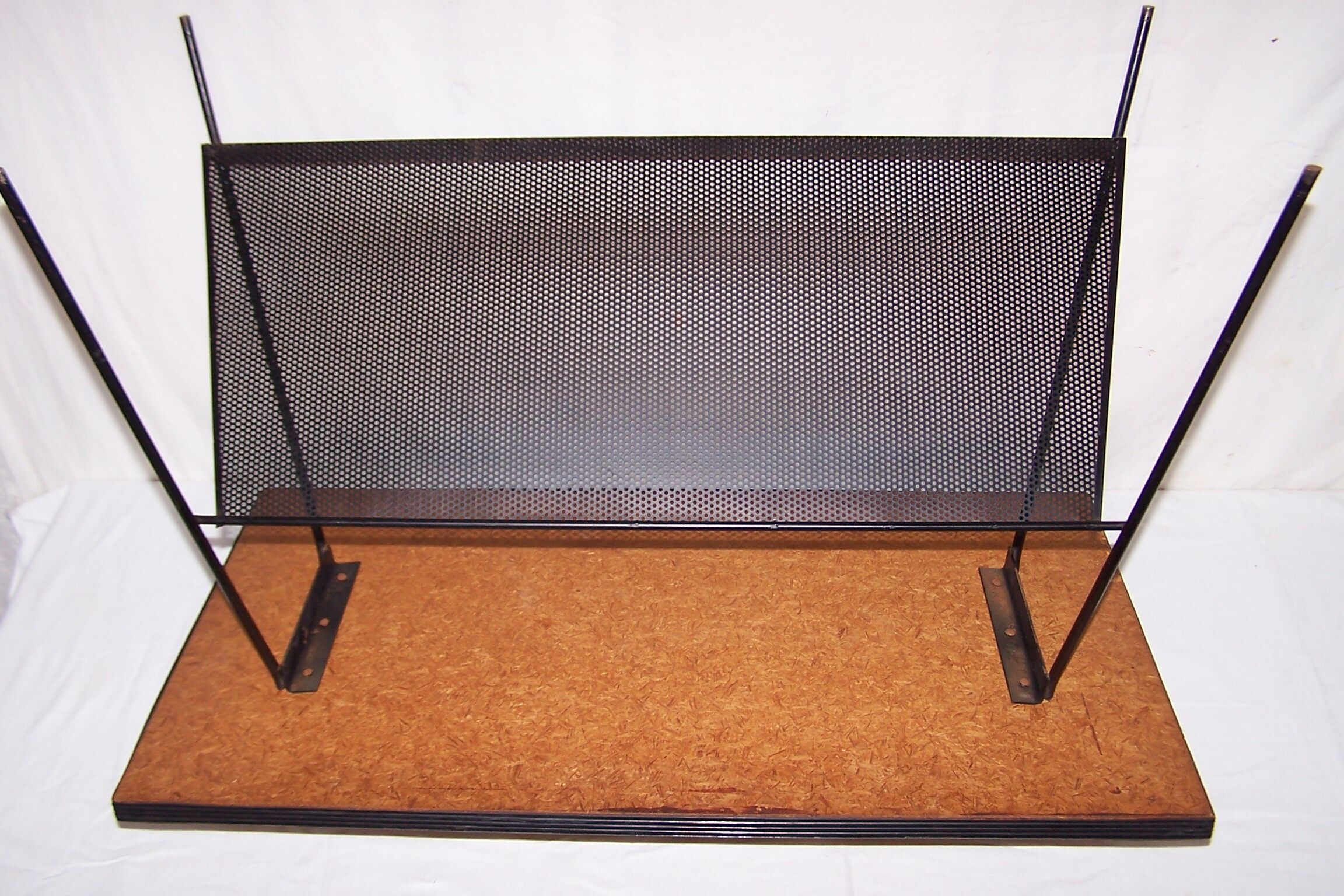 Perforated plate coffee table from the 1950s